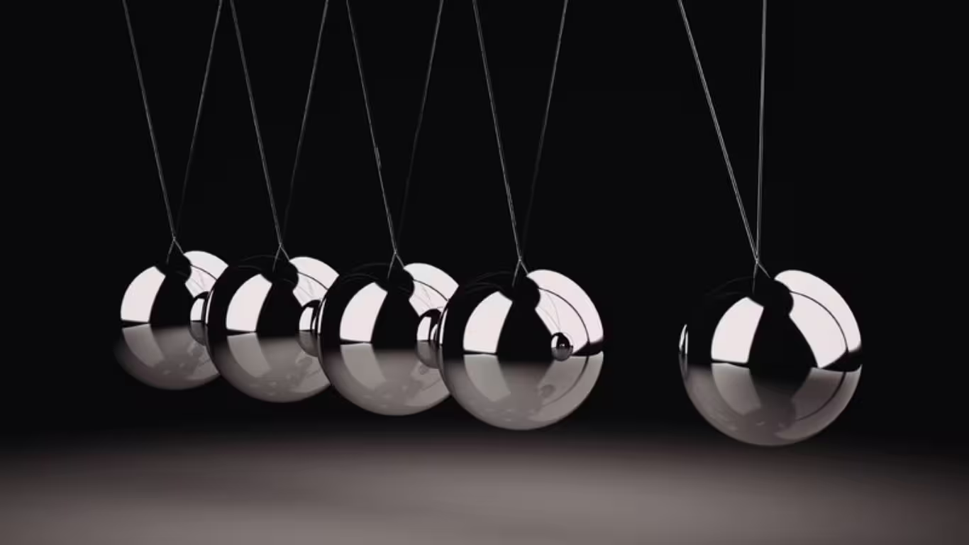 Newton's cradle illustrating sequence and timing