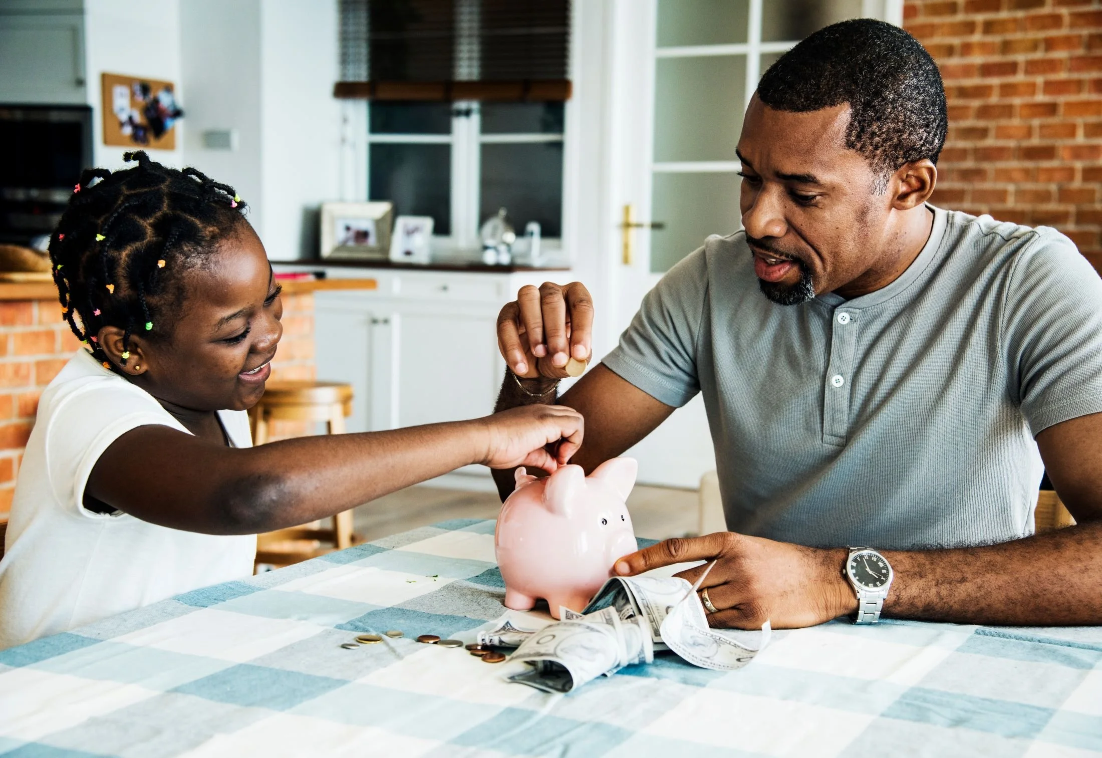 Family reviewing financial planning documents together