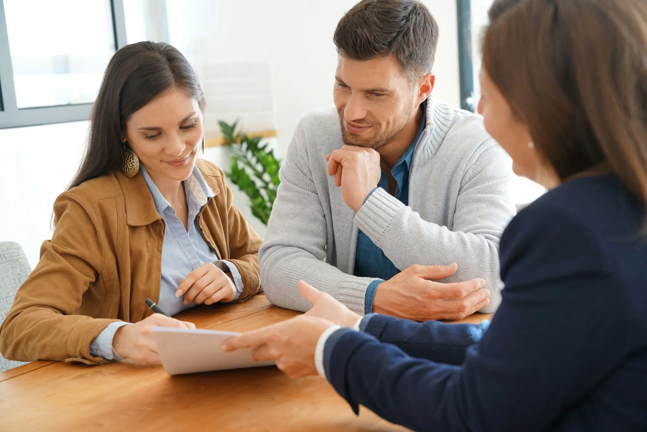 A family meeting with a financial professional at a table